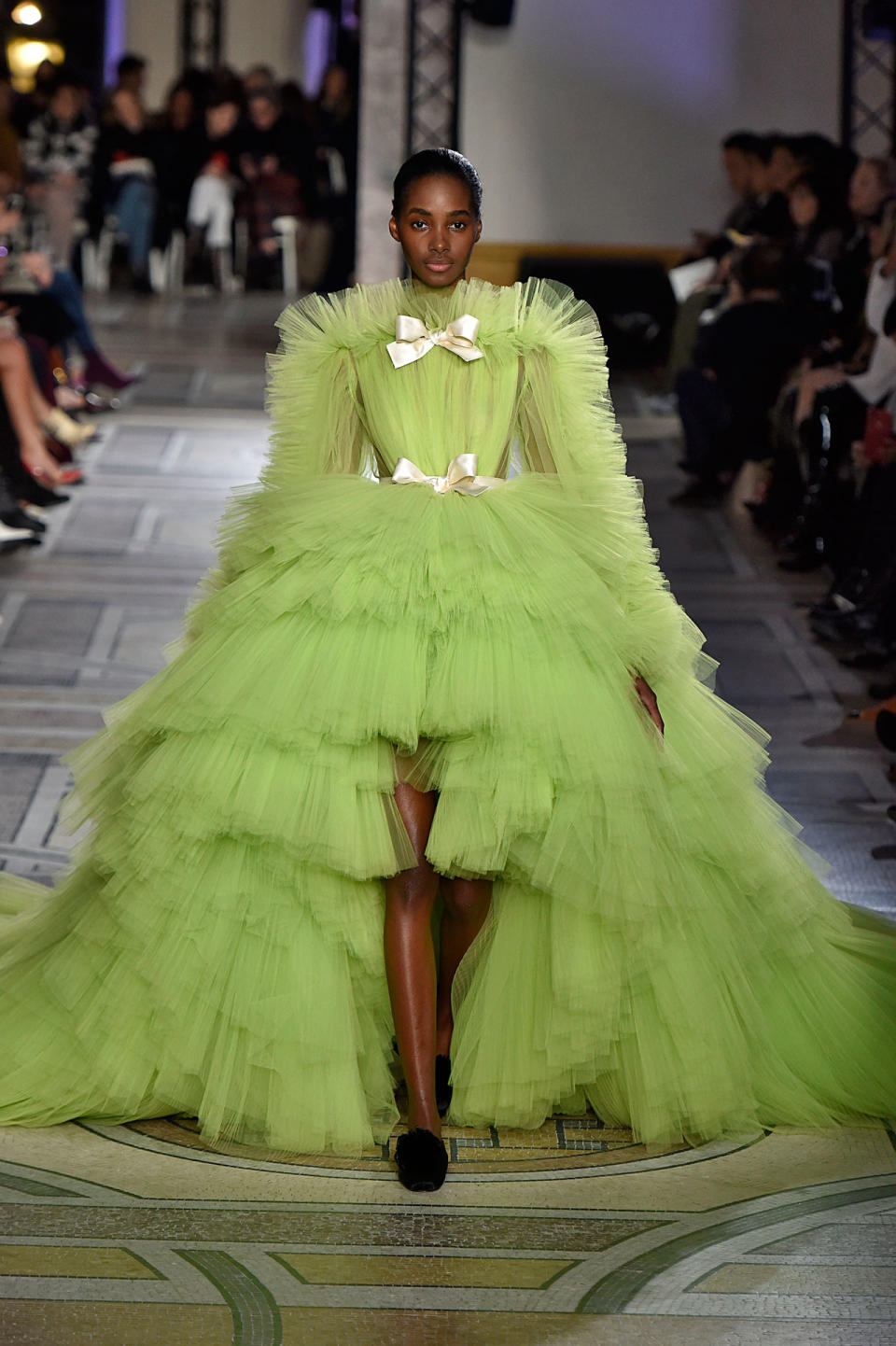 <p>Model wears a voluminous lime-green, multi-tier tulle gown from the Giambattista Valli SS18 Haute Couture show. (Photo: Getty Images) </p>