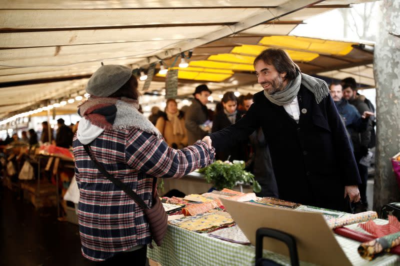 French mathematician Cedric Villani, member of Parliament and candidate for Paris mayoral election, campaigns in Paris