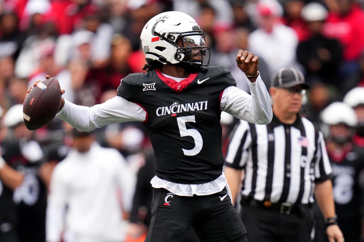 Cincinnati and quarterback Emory Jones (5) play Oklahoma State University on Saturday.