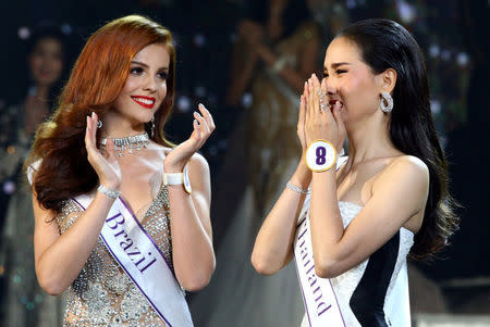 Contestant Jiratchaya Sirimongkolnawin of Thailand reacts as she is crowned winner of the Miss International Queen 2016 transgender/transsexual beauty pageant in Pattaya, Thailand, March 10, 2017. REUTERS/Athit Perawongmetha