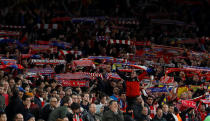 <p>Soccer Football – Europa League Semi Final First Leg – Arsenal vs Atletico Madrid – Emirates Stadium, London, Britain – April 26, 2018 Atletico Madrid fans hold up scarves Action Images via Reuters/Andrew Couldridge </p>