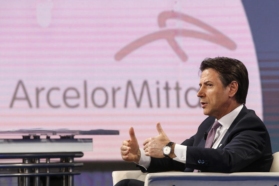 Italian Premier Giuseppe Conte speaks about steel maker ArcelorMittal during the Porta a Porta talk show, in Rome, Thursday, Nov. 7, 2019. (taly has given steel maker ArcelorMittal a few days to agree to a plan to keep operating a major southern Italian steel plant, where the company says legal challenges and a "climate of hostility" will hinder its business plans. (Fabio Frustaci/ANSA via AP)