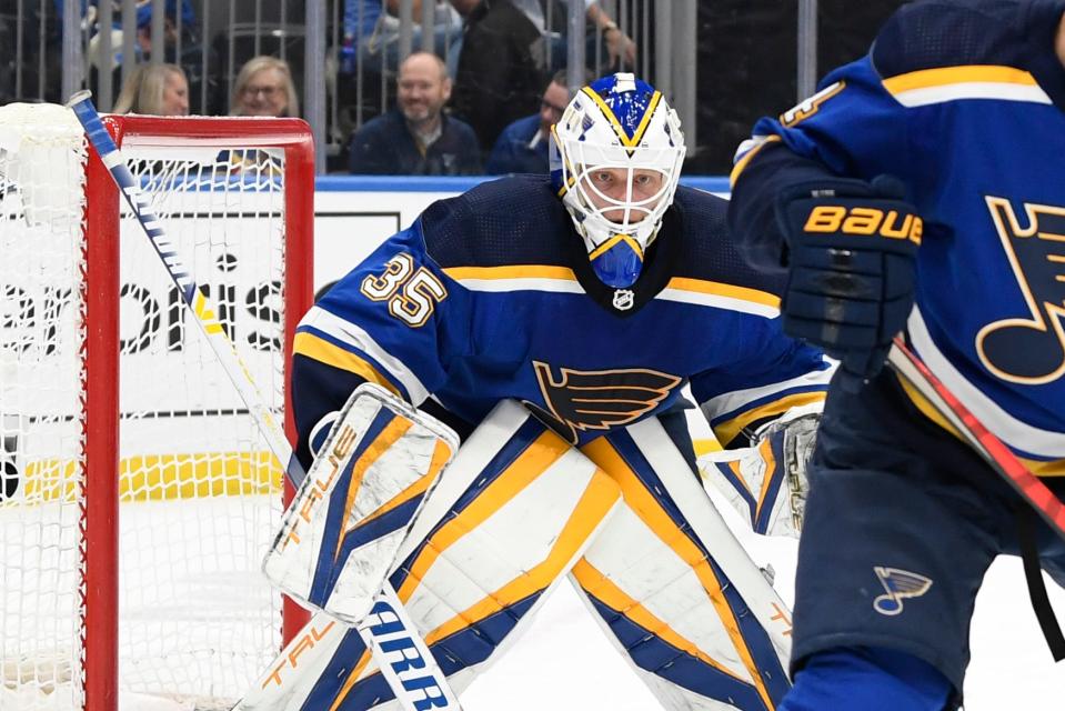 St. Louis Blues goaltender Ville Husso defends the net from the Colorado Avalanche during the first period in Game 4 of the second round of the playoffs May 23, 2022 in St. Louis.