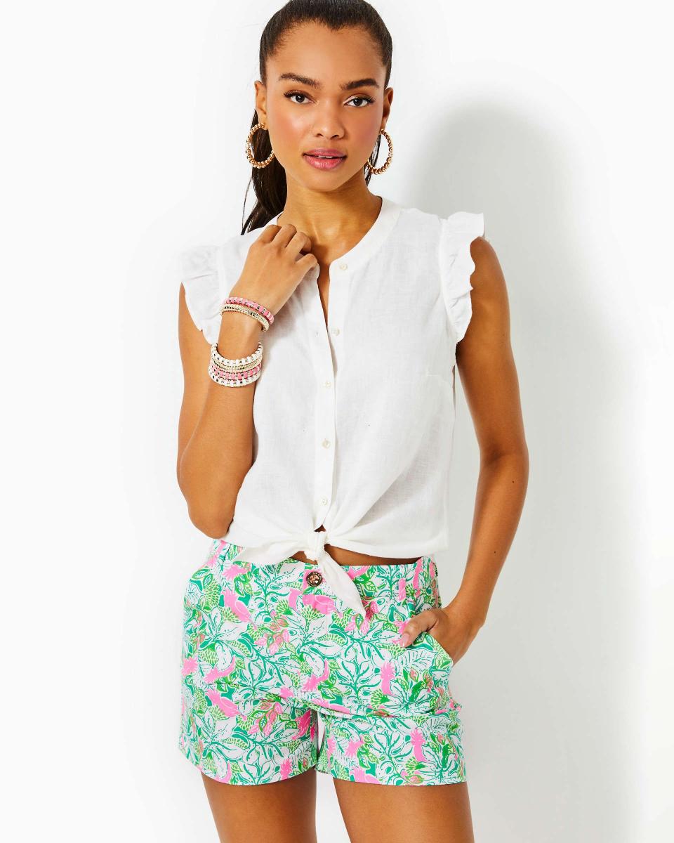 <p><a href="https://go.redirectingat.com?id=74968X1596630&url=https%3A%2F%2Fwww.lillypulitzer.com%2Fbriette-button-down-top%2F008296.html%3Fdwvar_008296_color%3D115&sref=https%3A%2F%2F" rel="nofollow noopener" target="_blank" data-ylk="slk:Shop Now;elm:context_link;itc:0;sec:content-canvas" class="link ">Shop Now</a></p><p>Briette Button Down Top</p><p>lillypulitzer.com</p><p>$39.00</p>