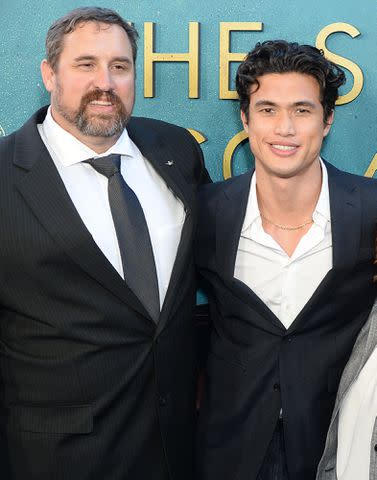 <p>Broadimage/Shutterstock</p> Charles Melton and his dad Phil Melton at the premiere of 'The Sun Is Also A Star' on May 13, 2019.