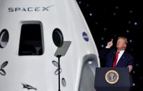 U.S. President Donald Trump speaks at a briefing after the launch of a SpaceX Falcon 9 rocket and Crew Dragon spacecraft on NASA's SpaceX Demo-2 mission to the International Space Station from NASA's Kennedy Space Center in Cape Canaveral