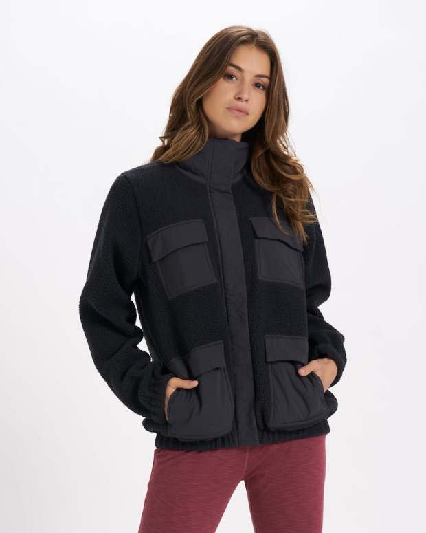 <p>Vuori</p><p>Before the temperatures call for thick down coats, teddy-style fleece fabric steps in to keep the chilly weather at bay. Put on the Utility Sherpa Jacket for long morning walks, coffee in hand, or wear it while camping, hiking, or cheering on your favorite football team. It’s roomy enough for added layers underneath, and the pockets fit all of the essentials: keys, cards, phone, and more.</p>
