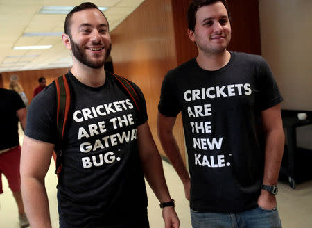 Gabi Lewis (L) and Greg Sewitz wear their t-shirts promoting crickets as food while attending the 'Eating Insects Detroit: Exploring the Culture of Insects as Food and Feed' conference at Wayne State University in Detroit, Michigan May 26, 2016. REUTERS/Rebecca Cook