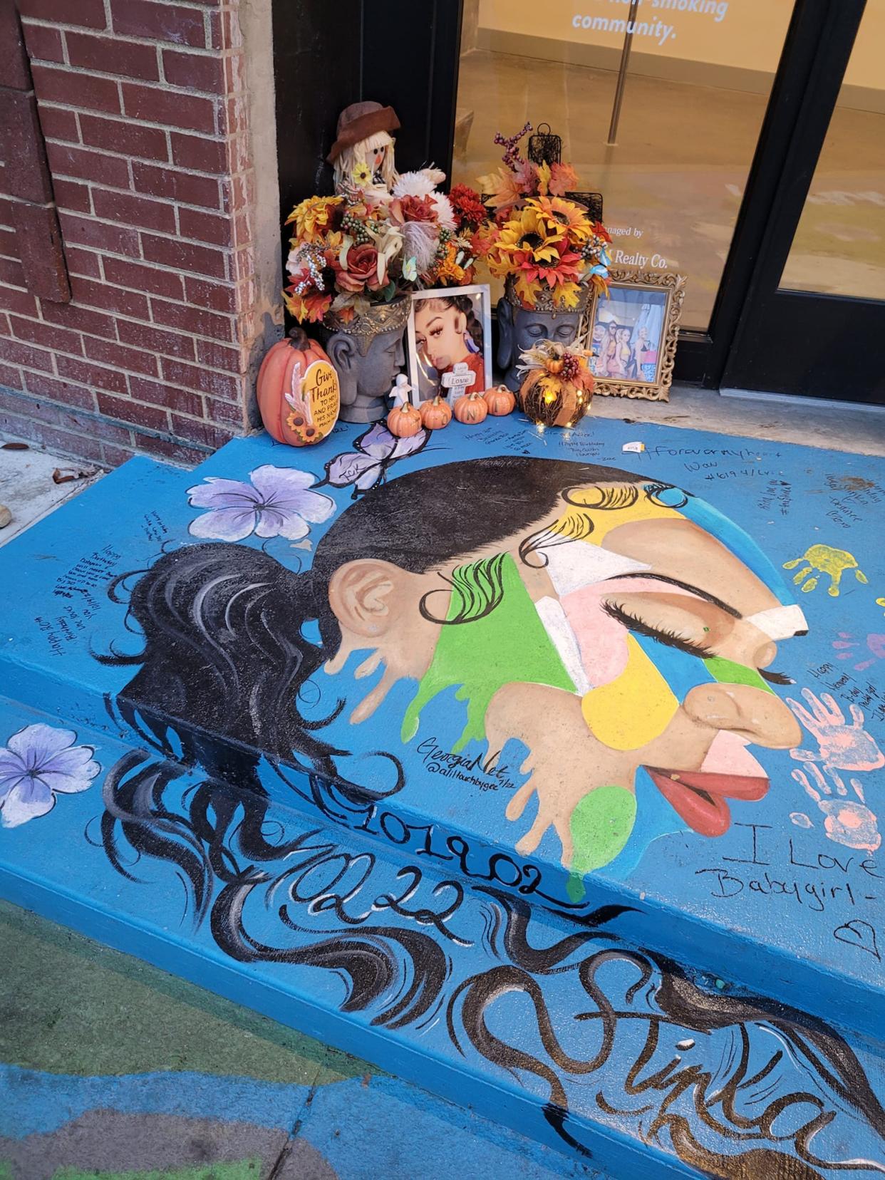 After weeks of uncertainty, the memorial to 19-year-old Toni Knight has found its forever home at the entrance to the ArtistSpace Lofts in downtown Petersburg. It now rests next to a mural that was painted on the sidewalk shortly after Knight was killed as she walked into the building July 2, 2022.