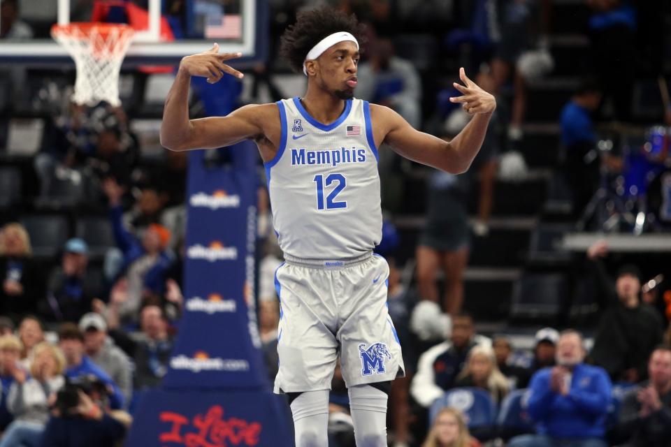 Memphis forward DeAndre Williams reacts after a basket during the first half of a game against Temple on Feb. 12.