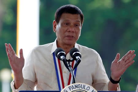 Philippine President Rodrigo Duterte speaks during a National Heroes Day commemoration at the Libingan ng mga Bayani (Heroes' Cemetery) in Taguig city, Metro Manila in the Philippines August 29, 2016. REUTERS/Erik De Castro