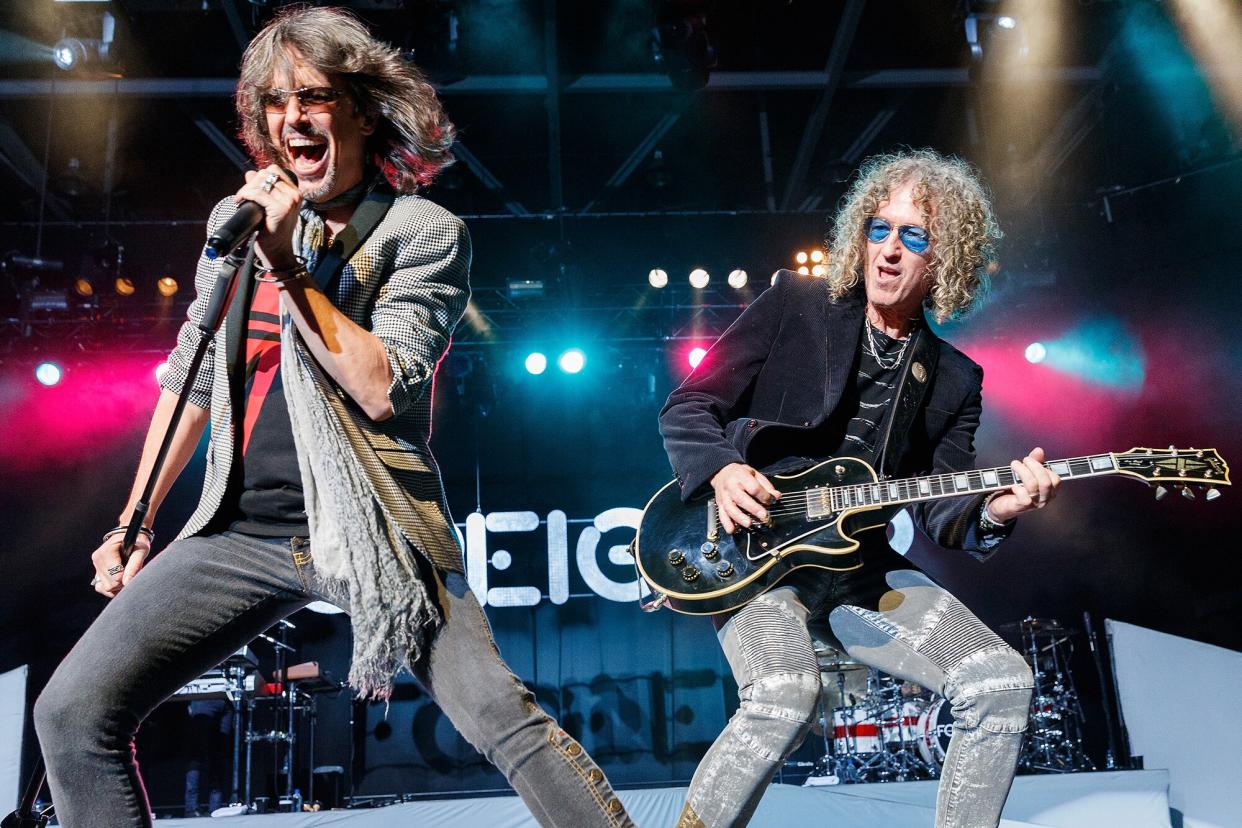 Kelly Hansen and Bruce Watson of Foreigner perform on stage at Abbotsford Centre on October 22, 2017 in Abbotsford, Canada.