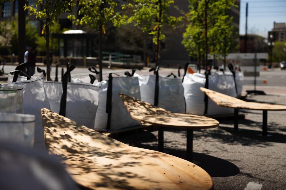 Benches are seen during the unveiling of the “Green Loop,, a temporary public park at 200 East 300 South in downtown Salt Lake City on Monday, May 1, 2023. | Ryan Sun, Deseret News
