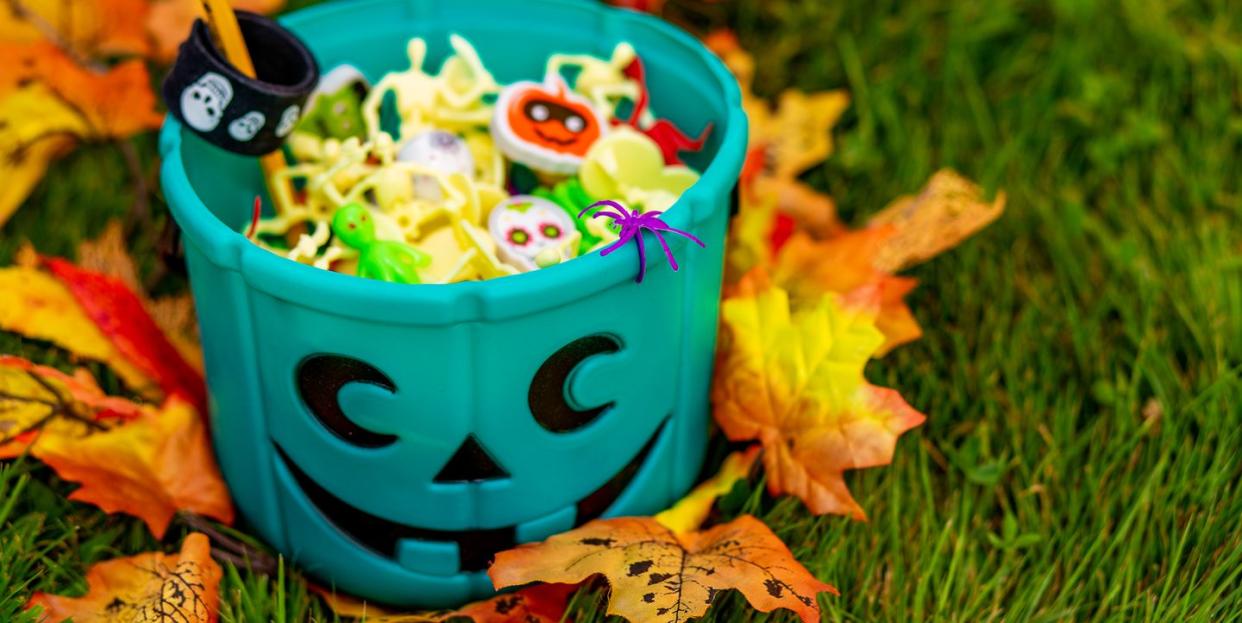 halloween teal basket full of non food treats