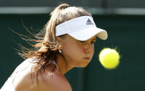 Daniela Hantuchova of Slovakia heeps her eye on the ball during her match against Heather Watson of Britain at the Wimbledon Tennis Championships in London, July 1, 2015. REUTERS/Suzanne Plunkett