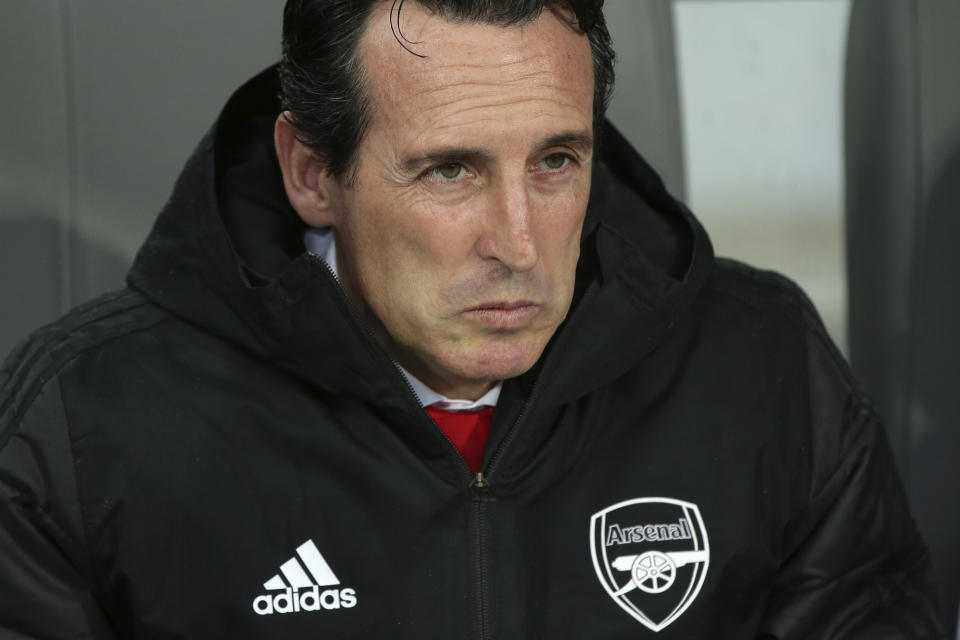 Arsenal's head coach Unai Emery sits on the bench during the Europa League group F soccer match between Vitoria SC and Arsenal at the D. Afonso Henriques stadium in Guimaraes, Portugal, Wednesday, Nov. 6, 2019. (AP Photo/Luis Vieira)