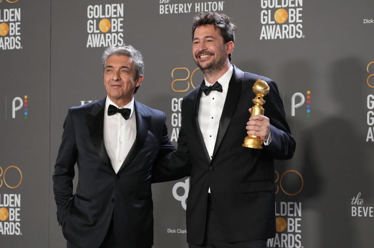 Actor Ricardo Darín, left, and director Santiago Mitre pose at the Golden Globe Awards after "Argentina, 1985" won Best Motion Picture in a Non-English Language. <a href="https://www.gettyimages.com/detail/news-photo/ricardo-dar%C3%ADn-and-santiago-mitre-pose-with-the-best-motion-news-photo/1455636406?phrase=argentina%201985&adppopup=true" rel="nofollow noopener" target="_blank" data-ylk="slk:Kevin Mazur/Getty Images;elm:context_link;itc:0;sec:content-canvas" class="link ">Kevin Mazur/Getty Images</a>