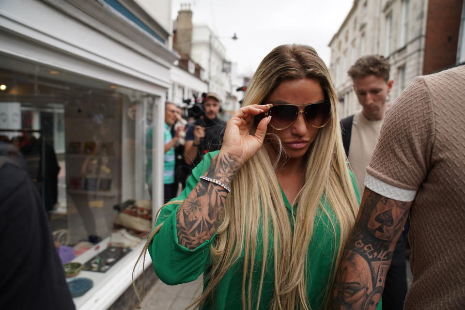 Katie Price leaves Lewes Crown Court, East Sussex, where she was sentenced to an 18-month community order with 150 hours of community service with an additional 20 hours for breach of a suspended sentence for driving matters. She was also ordered to pay £1,500 court costs.for breaching a restraining order. The 44-year-old former glamour model plead guilty to sending abusive messages to ex-husband Kieran Hayler about his new partner Michelle Penticost on January 21 this year. Picture date: Friday June 24, 2022. (Photo by Gareth Fuller/PA Images via Getty Images)