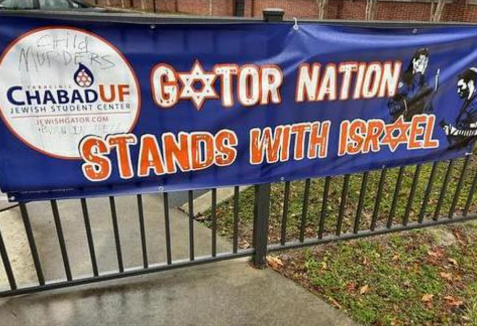 A person vandalized a banner supporting Israel outside the Lubavitch Chabad Jewish Student & Community Center at the University of Florida on Friday, Nov. 24, 2023, the organization said.