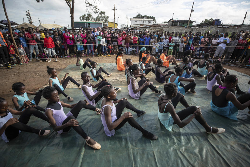 Young dancers perform during a Christmas ballet event in Kibera, one of the busiest neighborhoods of Kenya's capital, Nairobi, Friday, Dec. 15, 2023. The ballet project is run by Project Elimu, a community-driven nonprofit that offers after-school arts education and a safe space to children in Kibera. (AP Photo/Brian Inganga)