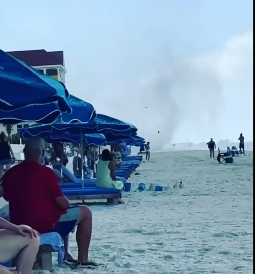 A waterspout that moved onshore at Redington Beach amazed Florida beachgoers.