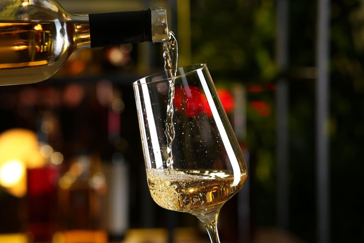Muscat wine being poured into a glass