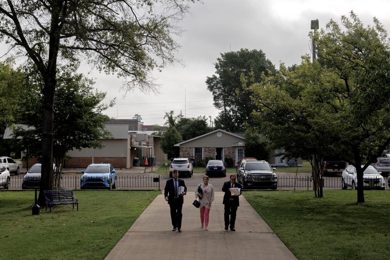 Image: Jana Bradford, center, arrives at the Little River County Courthouse in Ashdown, Ark., on May 9. (Shelby Tauber for NBC News)