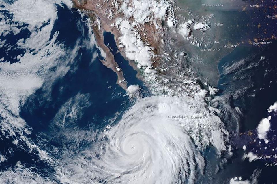 This handout satellite image courtesy of NOAA taken on August 16, 2023, shows hurricane Hilary approaching Baja California, Mexico. Tropical Storm Hilary strengthened into a major hurricane in the Pacific on August 16, 2023.