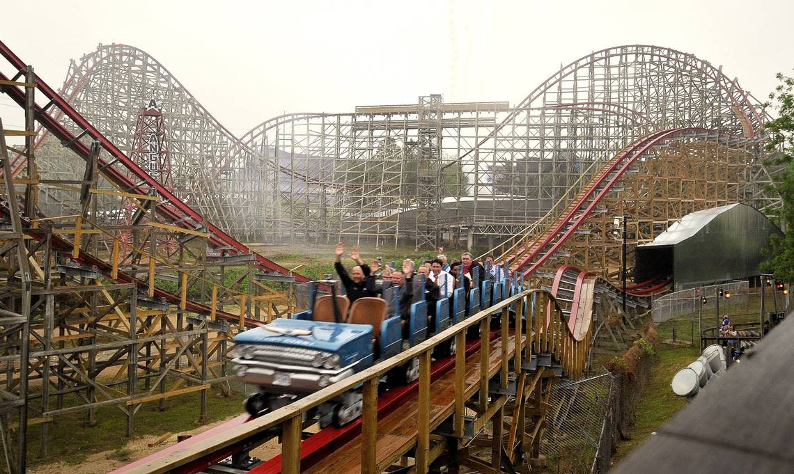 April 21, 2011: Roller coster fans ride the new and improved steel and wood super hybrid coaster at Six Flags Over Texas in Arlington.