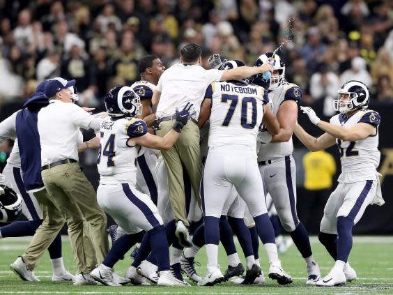 The Rams celebrate after defeating the Saints (Getty)