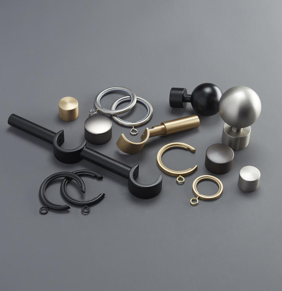 Selections from The Shade Store’s Saratoga brass hardware collection, including the Saratoga C-Ring 