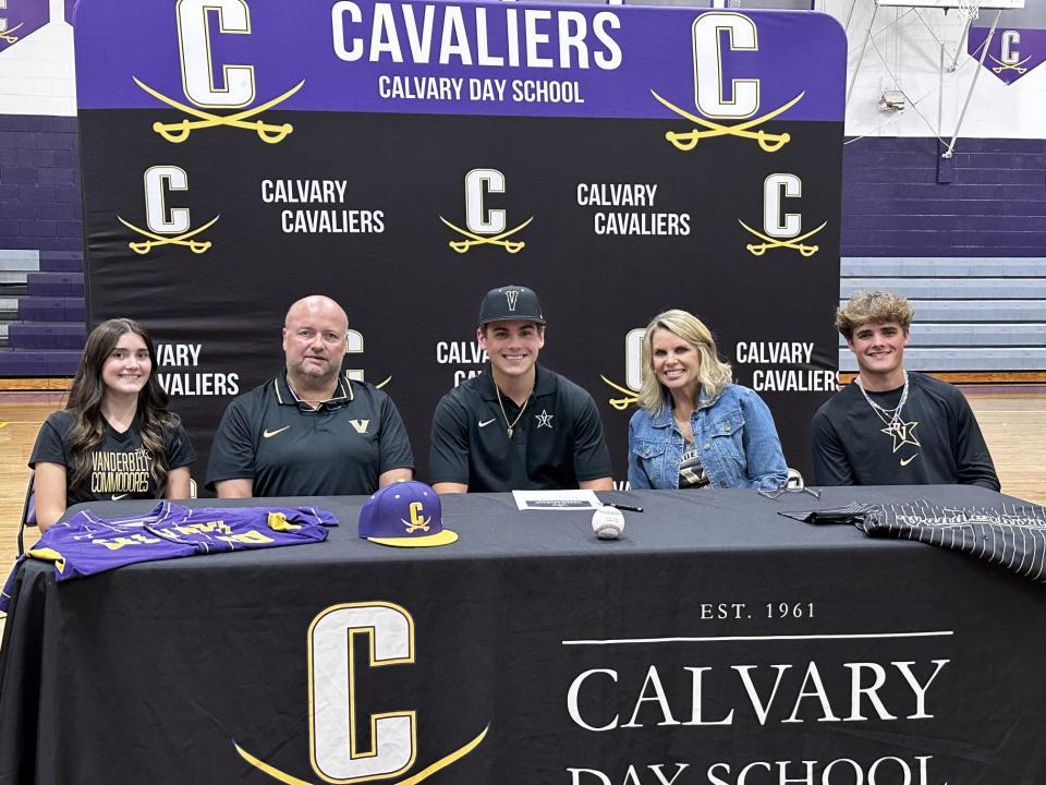 Will Hampton of Calvary Day, pictured with his family, signed to play baseball at Vanderbilt on Monday, Nov. 13, 2023.