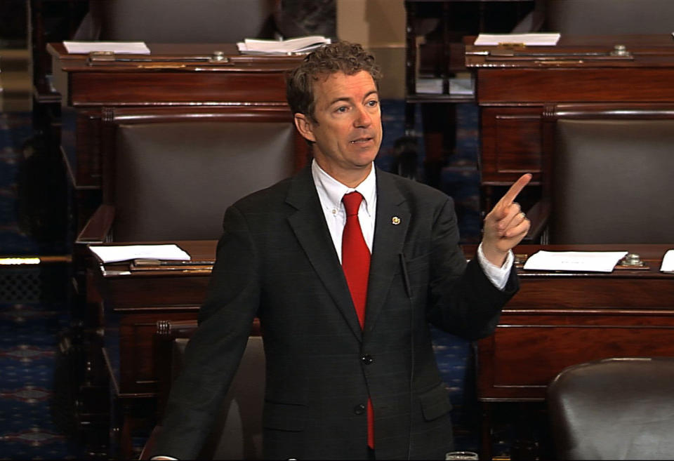 This video frame grab provided by Senate Television shows Sen. Rand Paul, R-Ky. speaking on the floor of the Senate on Capitol Hill in Washington, Wednesday, March 6, 2013. Senate Democrats pushed Wednesday for speedy confirmation of John Brennan's nomination to be CIA director but ran into a snag after a Paul began a lengthy speech over the legality of potential drone strikes on U.S. soil. But Paul stalled the chamber to start what he called a filibuster of Brennan's nomination. Paul's remarks were centered on what he said was the Obama administration's refusal to rule out the possibility of drone strikes inside the United States against American citizens. (AP Photo/Senate Television)