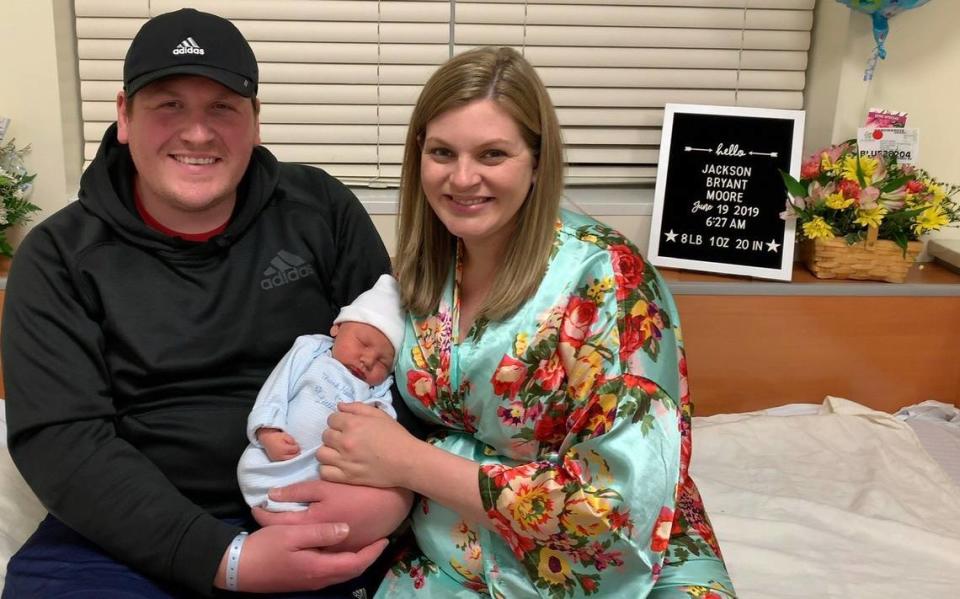 The Moore family’s first photo with Jackson, the day after he was born.