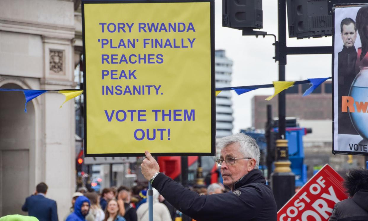 <span>A protester against the Rwanda bill makes his feelings known in Westminster in March.</span><span>Photograph: Vuk Valcic/Sopa Images/Rex/Shutterstock</span>
