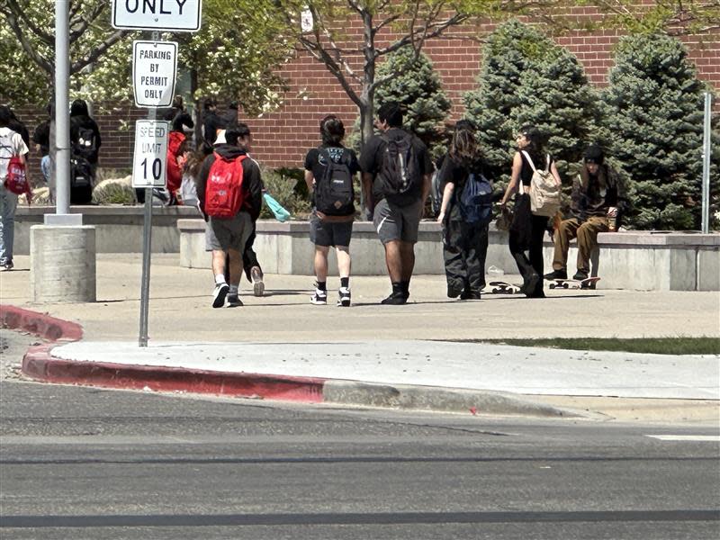 Students seen outside Granger High School on April 23, 2024.