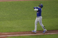 Toronto Blue Jays' Lourdes Gurriel Jr. gestures while running the bases after hitting a solo home run off Baltimore Orioles starting pitcher Thomas Eshelman during the fifth inning of a baseball game, Friday, June 18, 2021, in Baltimore. (AP Photo/Julio Cortez)