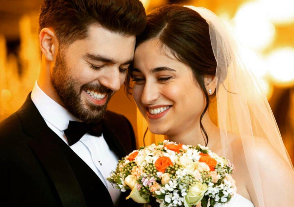 Arash Pourzarabi and Pouneh Gorji pictured on their wedding day. Source: Akhavan Studio via Azfar Rizvi