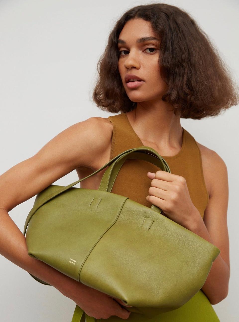 <p>The <span>Mansur Gavriel Tulipano Bag</span> ($695) is a polished choice for everyday. You'll never want to take it off.</p>