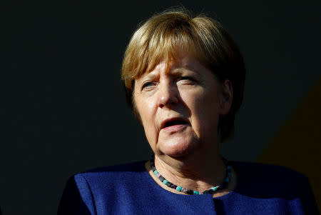 German Chancellor Angela Merkel, top candidate of the Christian Democratic Union Party (CDU), attends an election rally for the upcoming federal elections in Gelnhausen, near Frankfurt, Germany August 14, 2017. REUTERS/Ralph Orlowski