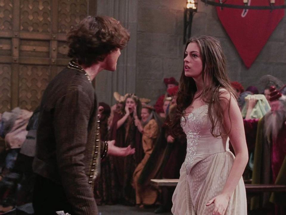 hugh dancy and anne hathaway in ella enchanteed staring at each other