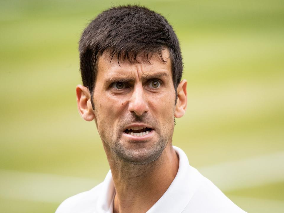 Novak Djokovic from Serbia reacts during his match against Rafael Nadal from Spain during The Wibledon Lawn Tennis Championship at the All England Lawn Tennis and Croquet Club at Wimbledon.