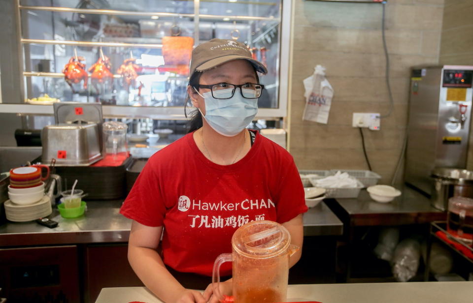 Michelin star Singapore-based Liao Fan Hawker Chan’s chicken rice shop supervisor Wyng Yap, 30, says they have seen more local tourists now after the lockdown eased. — Picture by Farhan Najib