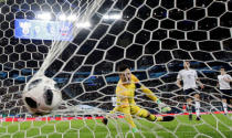 Soccer Football - International Friendly - Russia vs France - Saint-Petersburg Stadium, Saint Petersburg, Russia - March 27, 2018 Russia’s Fedor Smolov (not pictured) scores their first goal past France’s Hugo Lloris REUTERS/Anton Vaganov