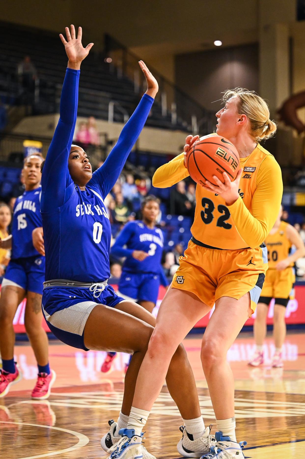 Seton Hall forward Makennah White takes a charge on Marquette forward Liza Karlen in the first half of their game Tuesday, February 20, 2024, at the Al McGuire Center in the Milwaukee, Wisconsin.