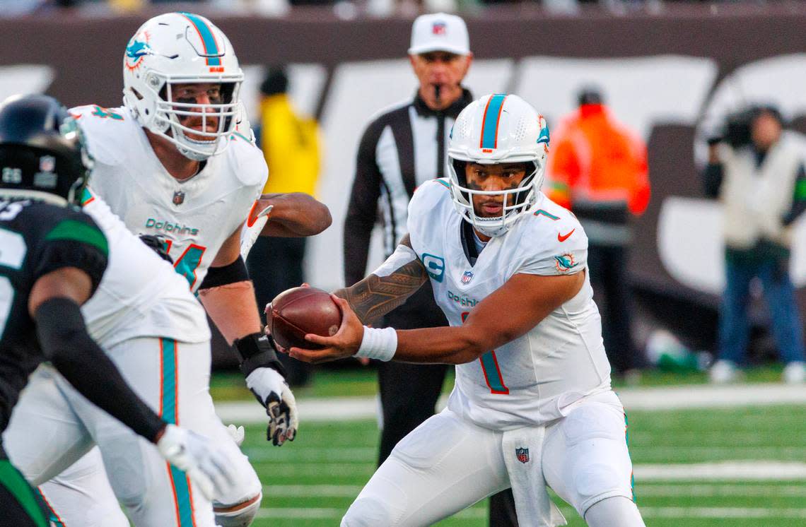 Miami Dolphins quarterback Tua Tagovailoa (1) lin action during second quarter of an NFL football game against the New York Jets at MetLife Stadium on Friday, Nov. 24, 2023 in East Rutherford, New Jersey.