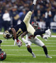 <p>New Orleans Saints returner Tommylee Lewis (11) is upended in front of Tampa Bay Buccaneers’ Peyton Barber (25) in the first half of an NFL football game in New Orleans, Sunday, Sept. 9, 2018. (AP Photo/Butch Dill) </p>