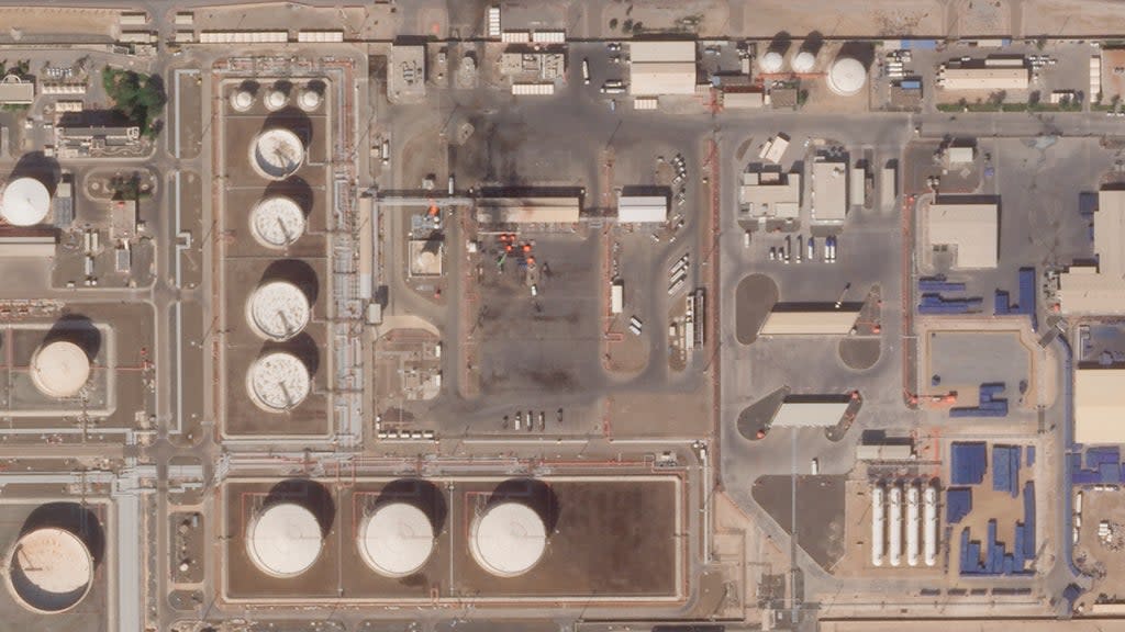 This satellite image provided by Planet Labs PBC shows the aftermath of an attack claimed by Yemen’s Houthi rebels on an Abu Dhabi National Oil Co. fuel depot on Jan. 22, 2022.  (AP)