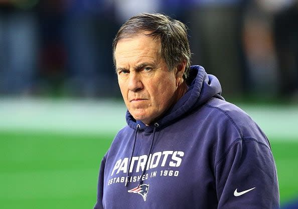 GLENDALE, AZ - FEBRUARY 01:  Head coach Bill Belichick of the New England Patriots  stands on the field during the pregame warm up prior to playing in Super Bowl XLIX at University of Phoenix Stadium on February 1, 2015 in Glendale, Arizona.  (Photo by Ronald Martinez/Getty Images)