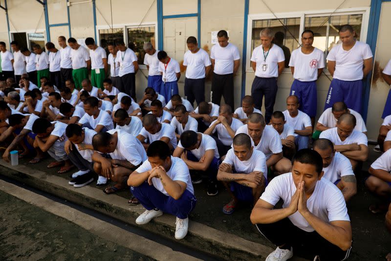 Drug rehab patients gather for a head count at the Mega Drug Abuse Treatment and Rehabilitation Center, in Nueva Ecija province, north of Manila